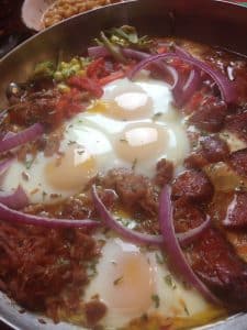 Huevos Flamencos : Eggs, Chorizos and Ham in Spicy Tomato Sauce