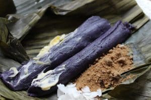Filipino Puto Bumbong – Steamed Purple Sticky Rice Logs with Coconut